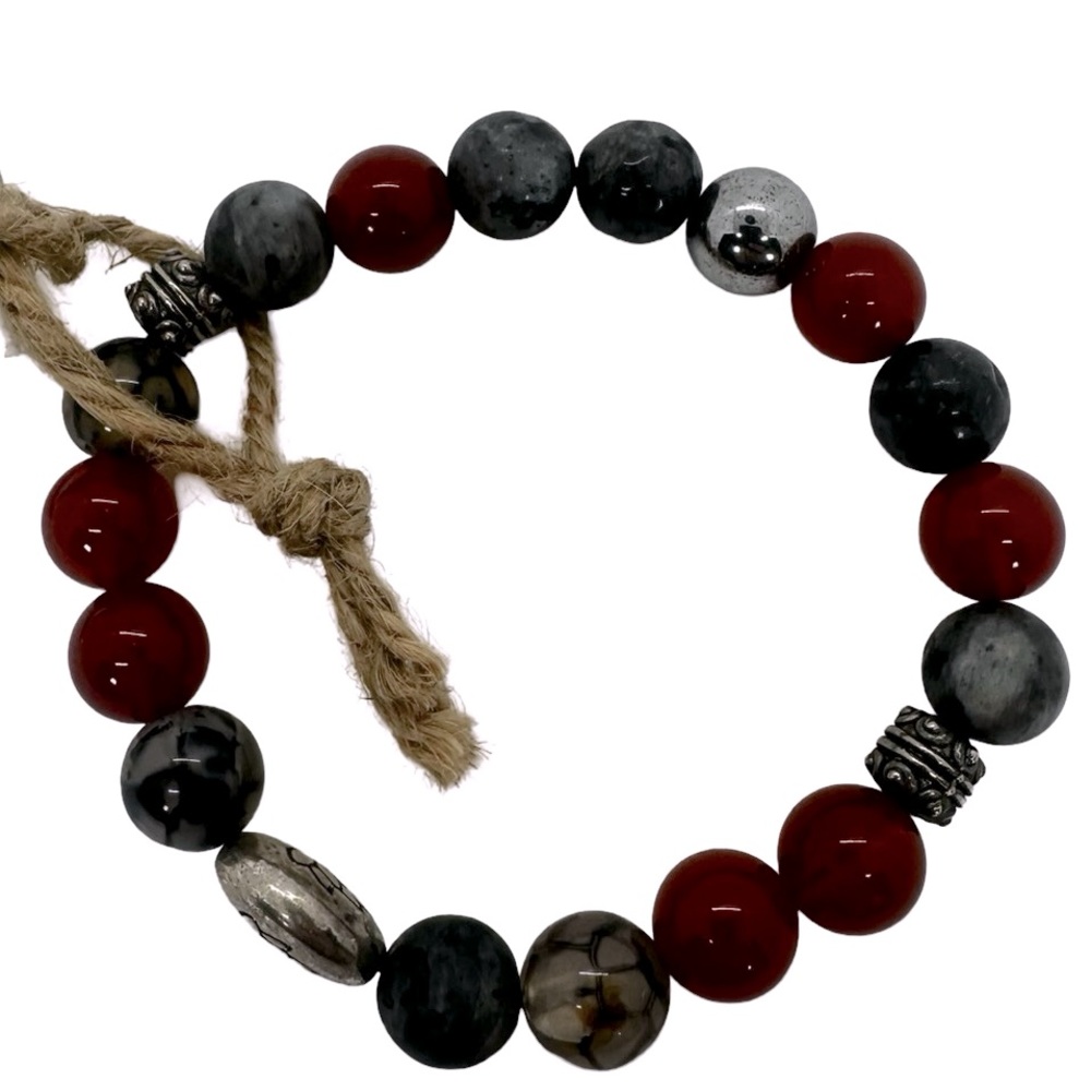 Handmade, one of a kind Chicago designer 3 in acrossed mounted on elastic cord